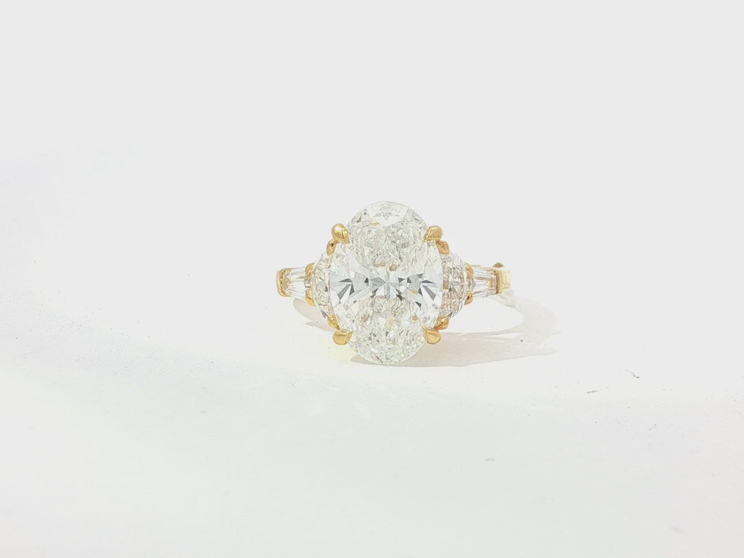 14k Gold Diamond Ring with Oval Center & Three-Stone Design 4.68ct
